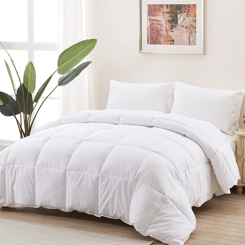 Price:$54.99  Duvet Insert King Comforter - Fluffy Down Alternative Fill Hotel Collection Comforter for King Bed,Lightweight Soft All Season Duvet Insert with Corner Tabs - Machine Washable,White,104x90 : Home & Kitchen