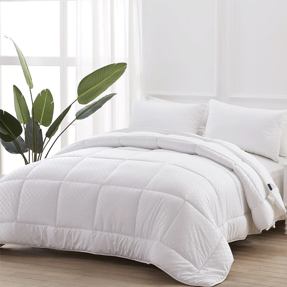Price:$39.99  White Down Alternative Comforter King Size - Embossed Microfiber Soft Lightweight Quilted Comforter Duvet Insert with Corner Tabs - All Season Bed Comforter - Machine Washable,104x90