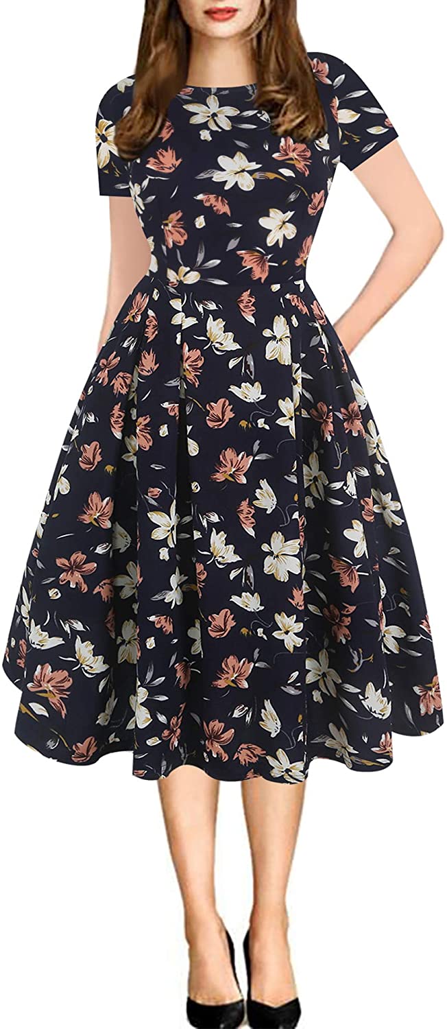 Price:$19.99 Sakaly Women's Patchwork Polka Dot Floral Pockets Short Sleeve Swing Work Party Cocktail Dress SK165 at Amazon Women’s Clothing store