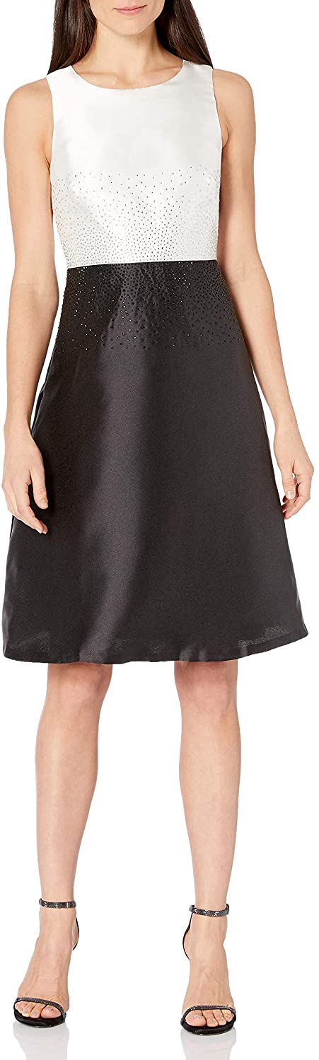 Price:$31.99    Calvin Klein Women's Sleeveless A-line Cocktail Dress with Embellishment  Clothing