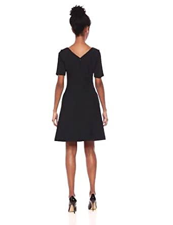 Price:$102.34 Elie Tahari Women's Stretch Houndstooth Kelsey Dress at Amazon Women’s Clothing store