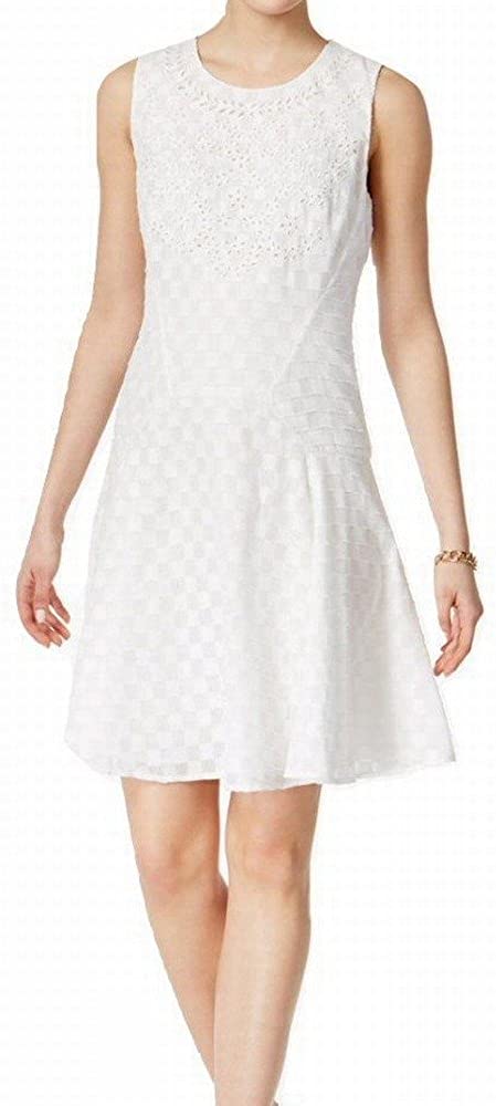 Price:$31.98 Tommy Hilfiger $139 Womens Eyelet Textured White Drop Waist Dress 12 B+B at Amazon Women’s Clothing store