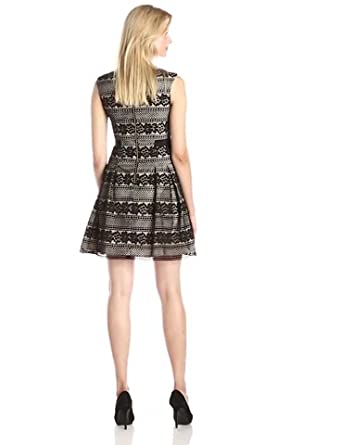 Price:$164.11 Vince Camuto Women's Cap Sleeve Lace Fit and Flare Dress, Black, 14 at Amazon Women’s Clothing store