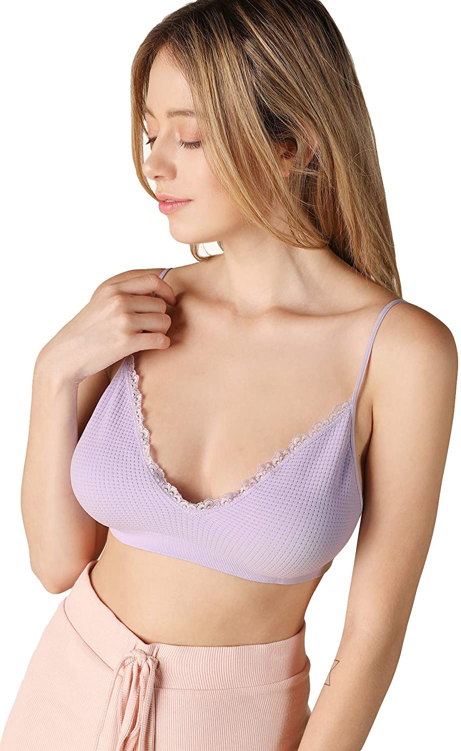 Price:$18.95 NIKIBIKI Women Seamless Lace Bralette, One Size (Little Lilac) at Amazon Women’s Clothing store