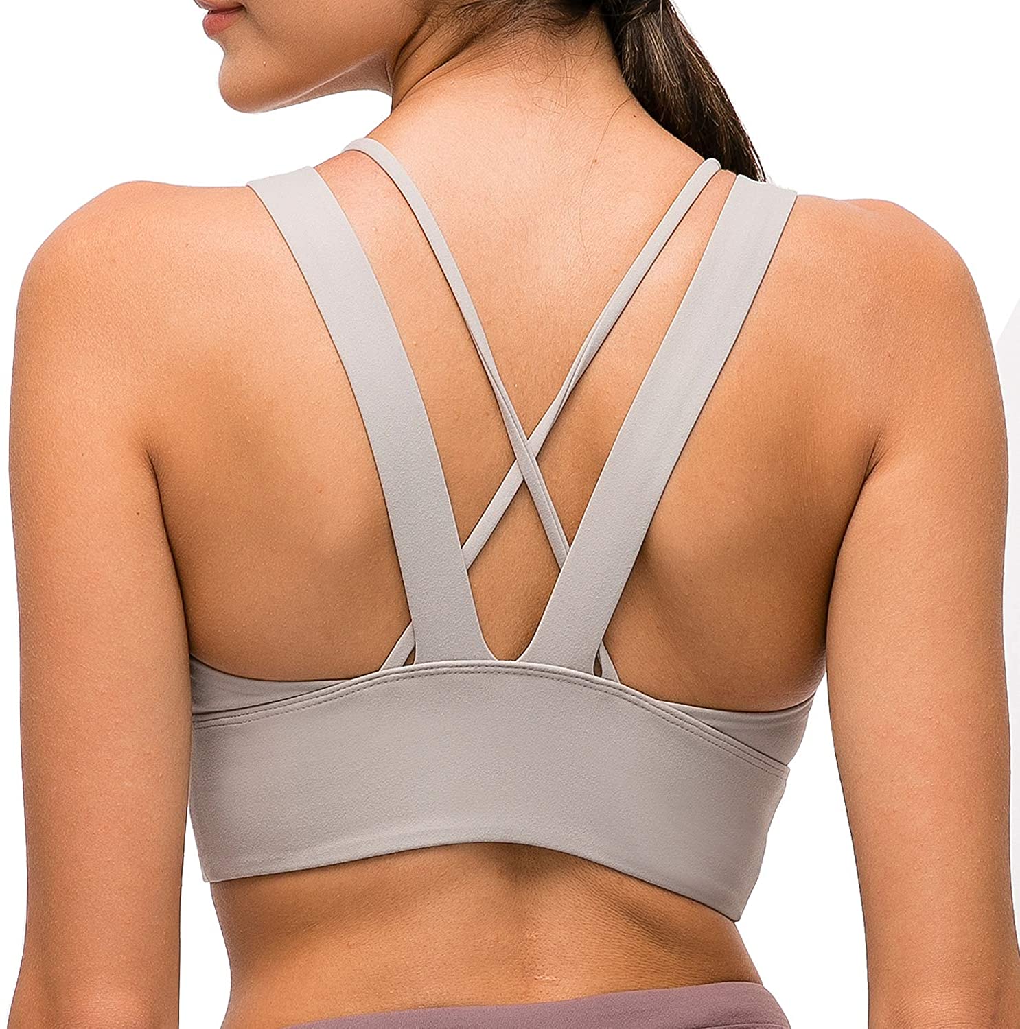 Price:$18.99 Lavento Women's Strappy Sports Bra Longline Padded Medium Support Workout Yoga Bra Tops at Amazon Women’s Clothing store