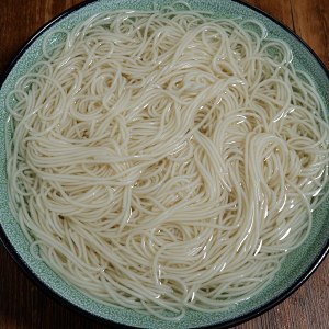 The practice measure of green oily noodles served with soy sauce 8