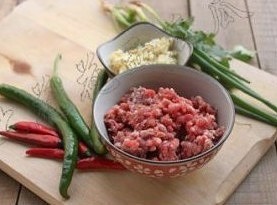 The practice measure of face of beef of unripe any of several hot spice plants 1