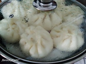 The practice step that takes 5 pork turnip steamed stuffed bun at a heat 9