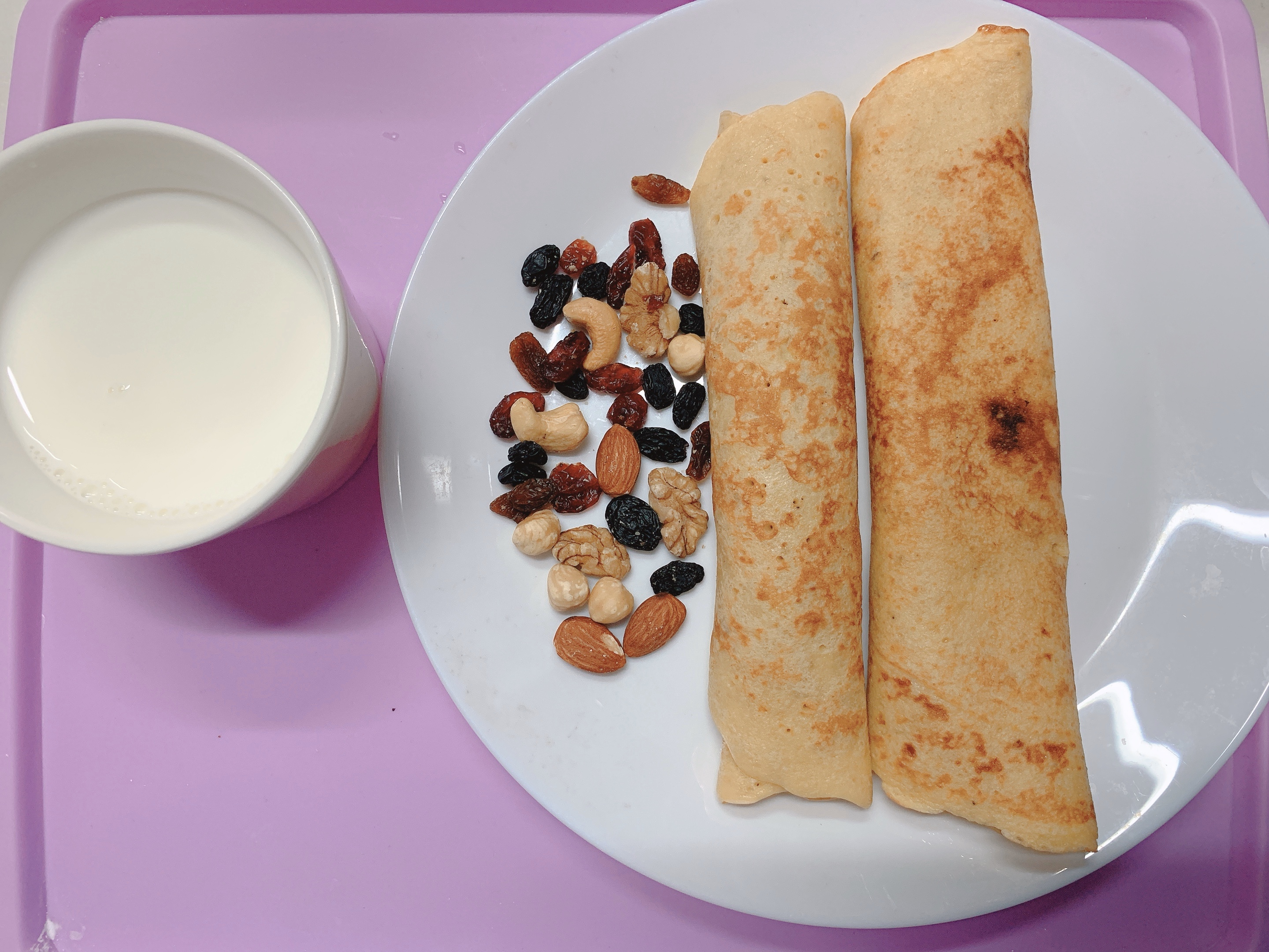 
Quick worker breakfast - the practice of banana thin pancake made of millet flour