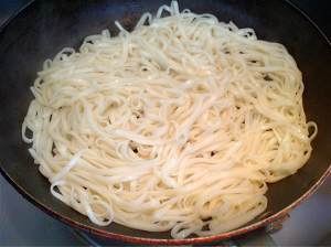 The practice measure of thin pancake made of millet flour of fine dried noodles 4