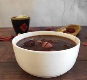 The practice measure of congee of lotus seed of violet potato black rice 9