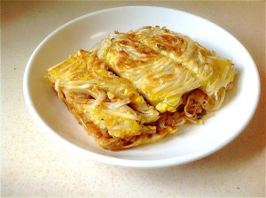 The practice measure of thin pancake made of millet flour of fine dried noodles 9