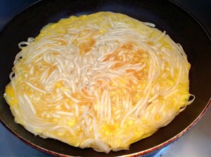 The practice measure of thin pancake made of millet flour of fine dried noodles 6