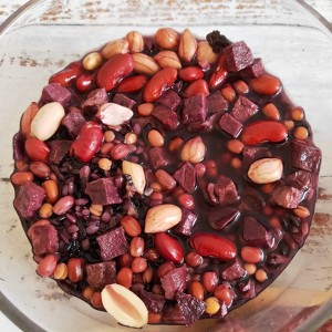 The practice measure of congee of lotus seed of violet potato black rice 2