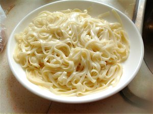 The practice measure of thin pancake made of millet flour of fine dried noodles 2