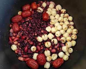 The practice measure of congee of lotus seed of violet potato black rice 5