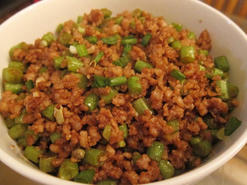 
Dish of go with rice - cowpea fries the practice with rotten meat