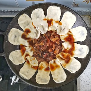 The practice measure of bake corn or millet cakes on a pan of ground boiler chicken 11