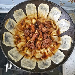 The practice measure of bake corn or millet cakes on a pan of ground boiler chicken 13