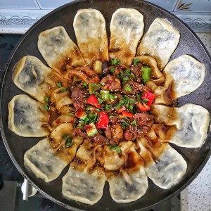 The practice measure of bake corn or millet cakes on a pan of ground boiler chicken 14