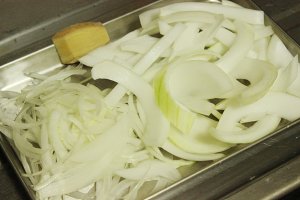 The practice measure of rice served with meat and vegetables on top of day type beef 3