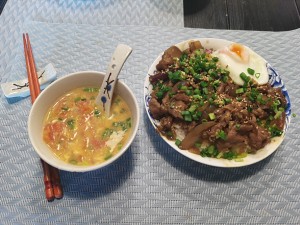 The practice measure of rice served with meat and vegetables on top of beef of bright family name 15