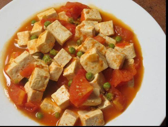 
Tomato burns the practice of bean curd, how to do delicious