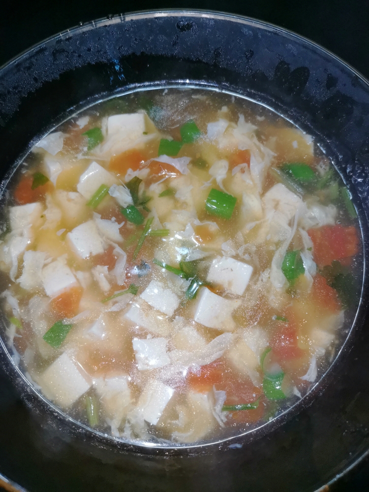 
The practice of a thick soup of egg tomato bean curd, how to do delicious
